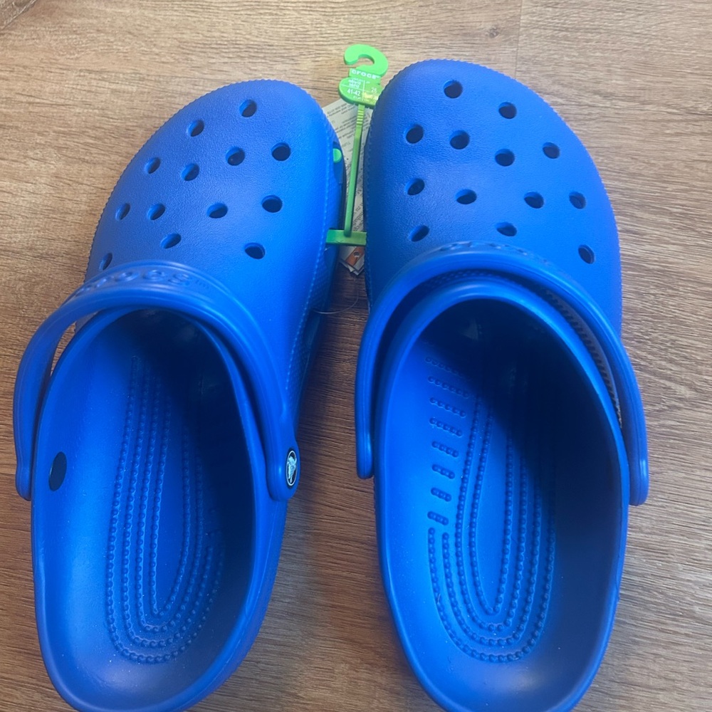 Brand new  blue classic crocs …size men’s 8 women’s 10